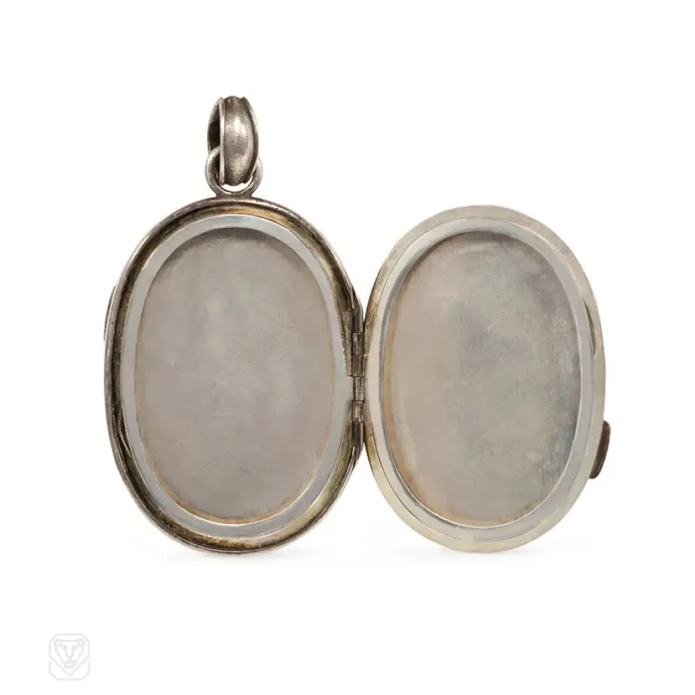 Antique two-sided shakudo locket