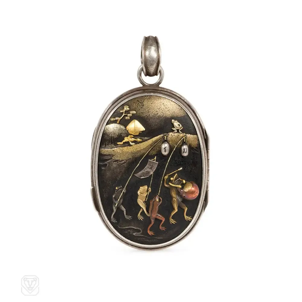 Antique two-sided shakudo locket